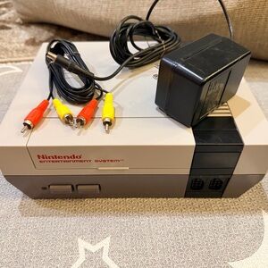 Nintendo Entertainment System with Red and Yellow Cables